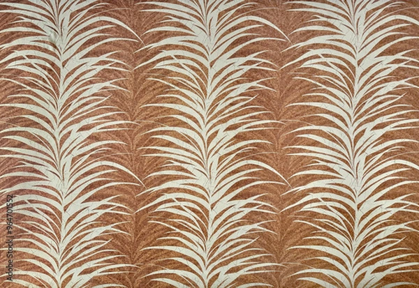 Fototapeta Close up of plant palm leaves white silhouette on a brown copper background. Illustration of palm leaves seamless background texture, suitable for wallpaper or wall covering.