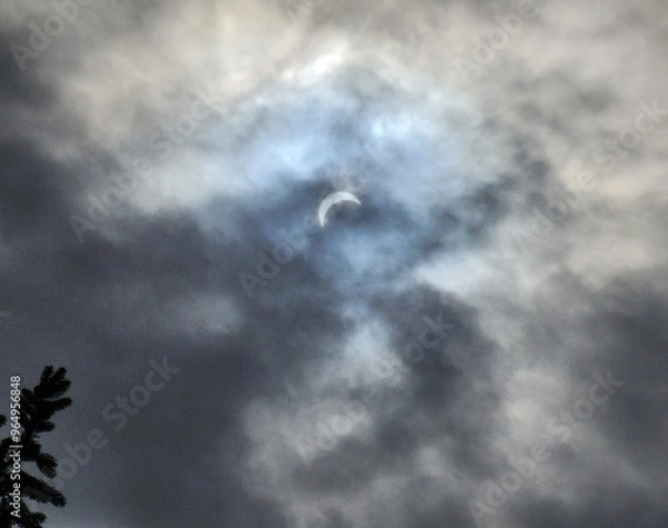 Fototapeta eclipse in clouds