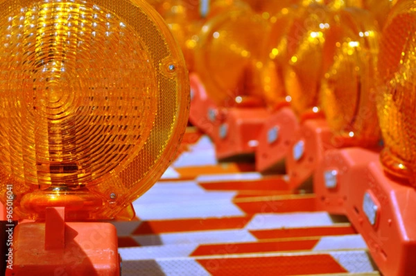 Obraz construction warning barriers stacked in a row