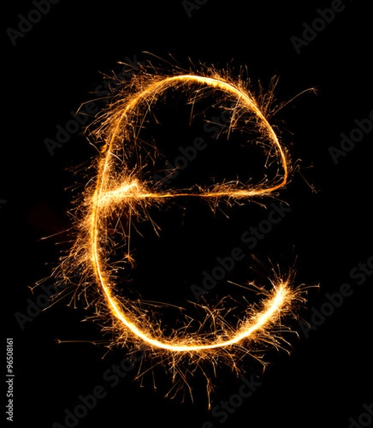 Fototapeta Sparkler firework light alphabet e (Small Letters) at night