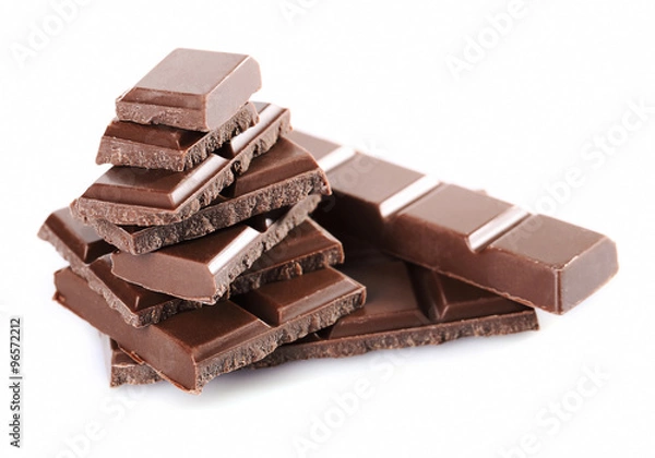 Fototapeta Milk chocolate pieces isolated on white background