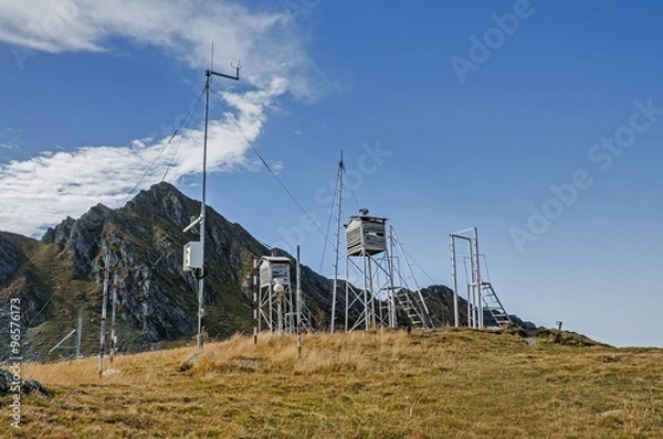 Obraz Old weather station in the high mountains