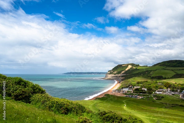Fototapeta View of Seatown beach and surrounding rolling landscape by the English Channel in Dorset, England