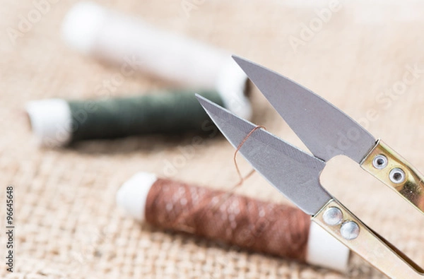 Fototapeta scissors cut thread
