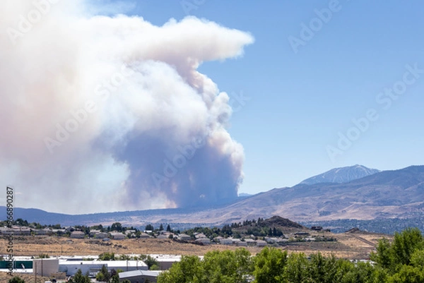 Fototapeta Massive plume of wildfire smoke seen over Reno Nevada from the North Valleys. Davis fire.
