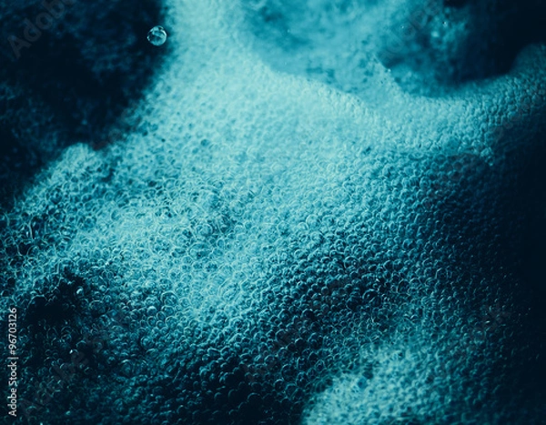 Fototapeta Closeup of a fast flowing water of a mountain stream