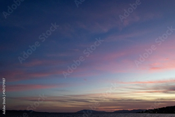 Obraz ピンク色の雲の夕焼け空