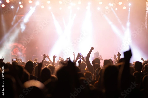 Obraz Crowd at concert and colorful stage lights.