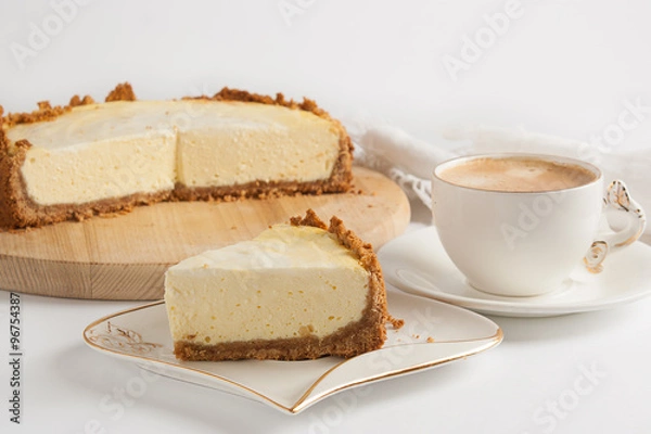 Obraz Cheesecake and coffee on a white background