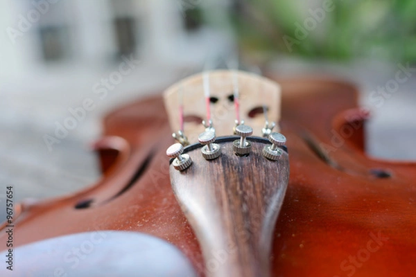 Fototapeta Violin tuner.