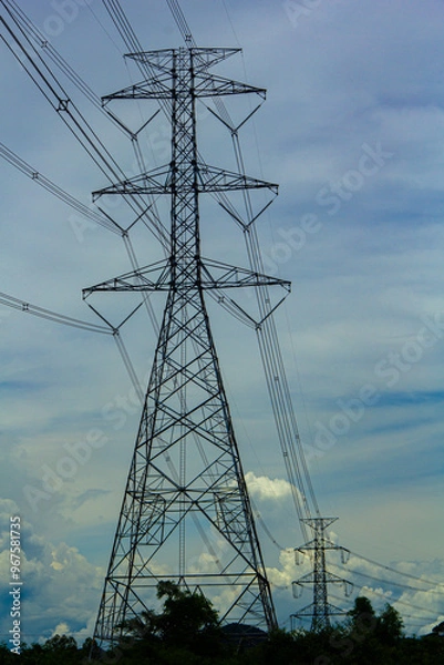 Fototapeta electricity transmission pylon silhouetted