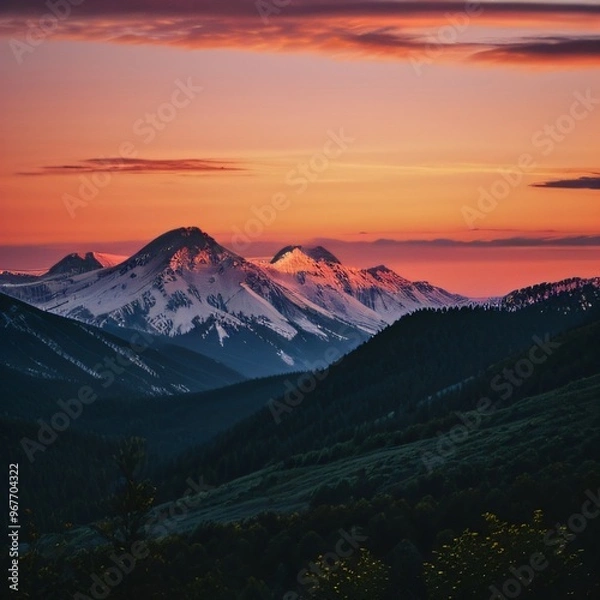 Fototapeta Breathtaking Sunset Over Snow-Capped Mountain Peaks and Forests..