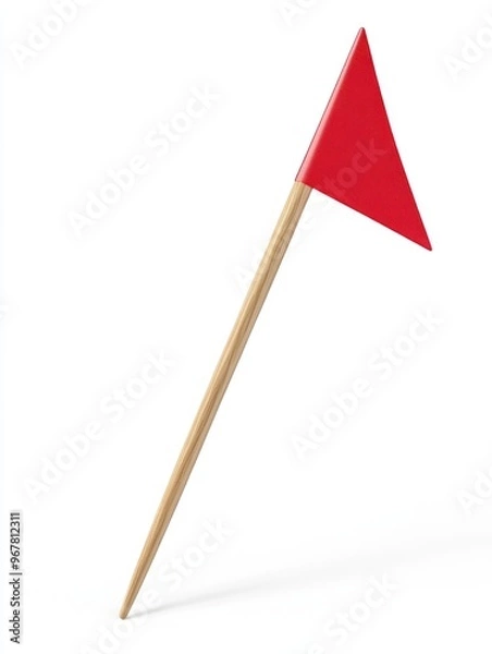 Fototapeta A wooden toothpick with a red flag on top, suggesting direction or focus. The background is white and light grey, highlighting the object.
