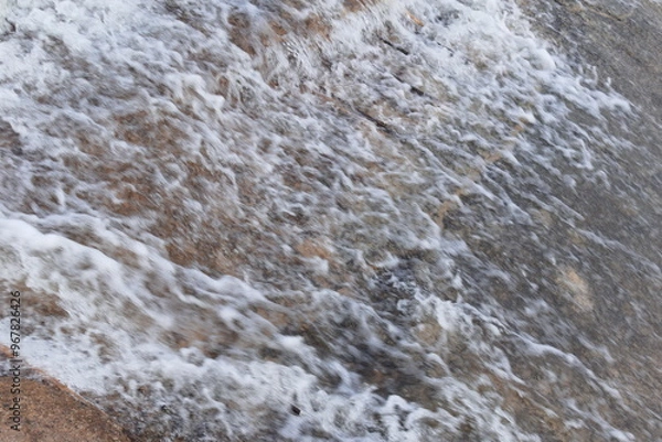 Fototapeta water flowing in the river