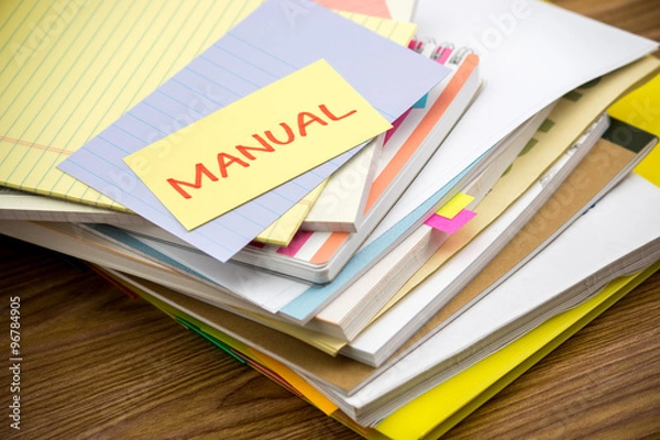 Fototapeta Manual; The Pile of Business Documents on the Desk