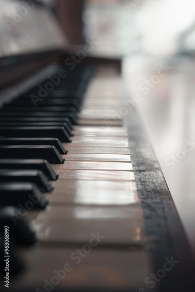 Obraz Closeup with shallow depth of field of the keyboard of an old real wooden piano.