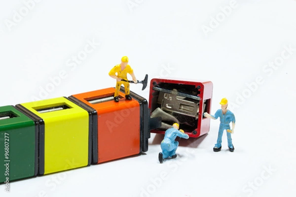 Fototapeta Under construction and teamwork concept - construction workers performing repair broken parts