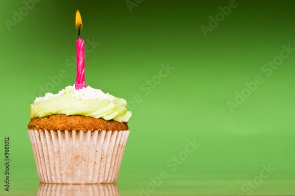 Fototapeta Small green cake with a single candle