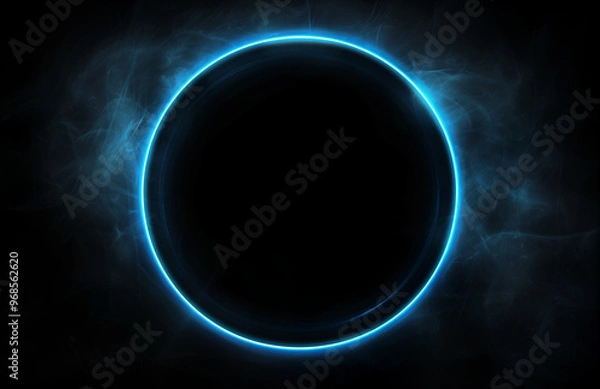 Fototapeta A blue, glowing line forming a circle on a black background.