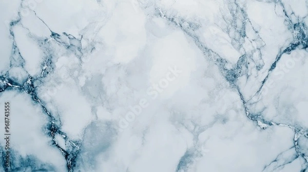Fototapeta White marble with silver and pale blue veins, creating a serene and minimalist background. No people. No logo.