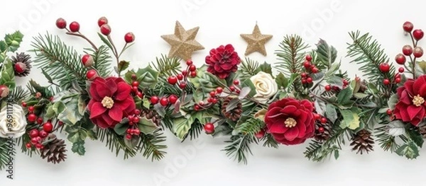 Fototapeta Christmas decorations on a white backdrop rose hips stars and fir branches. with copy space image. Place for adding text or design