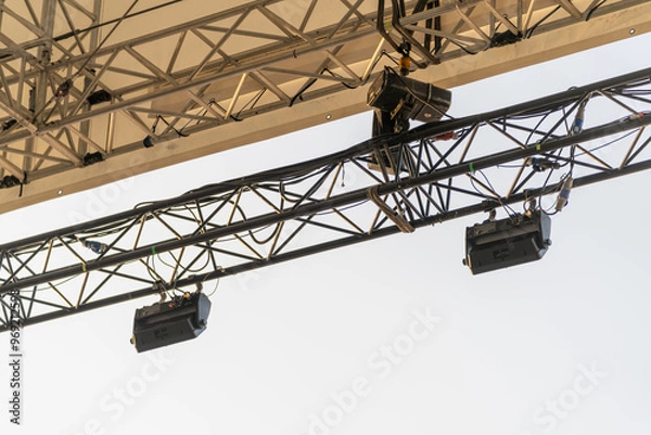 Fototapeta Outdoor aluminum concert stage frame parts and rigging mechanism elements designed for supporting and securing stage structures during events