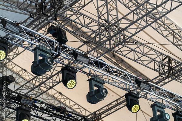 Fototapeta Professional lighting system on the concert stage used for enhancing live performances