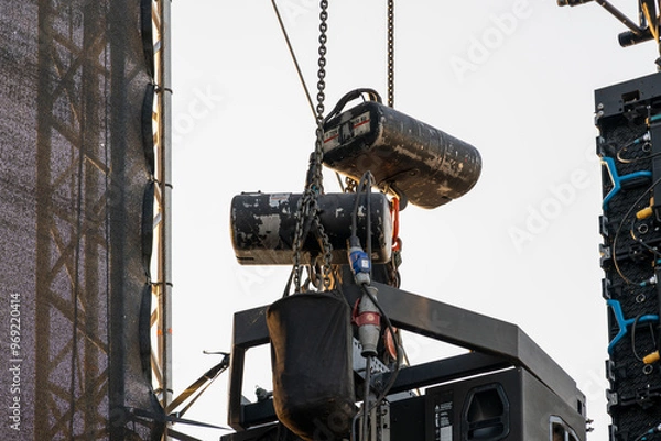 Fototapeta Outdoor aluminum concert stage frame parts and rigging mechanism elements designed for supporting and securing stage structures during events