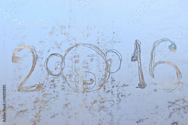 Fototapeta written on frosty winter window background