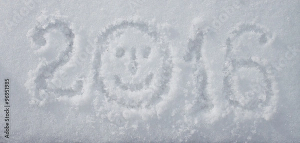 Fototapeta "2016" written on snow surface.