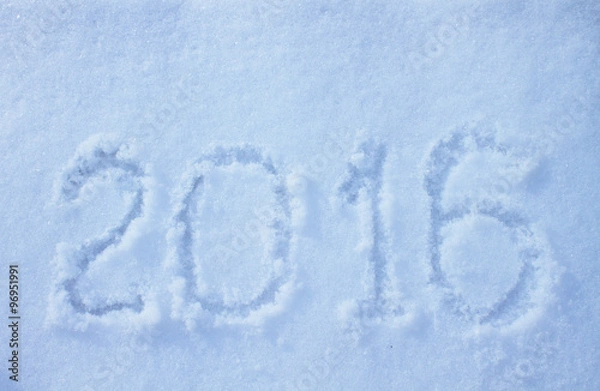 Fototapeta "2016" written on snow surface.