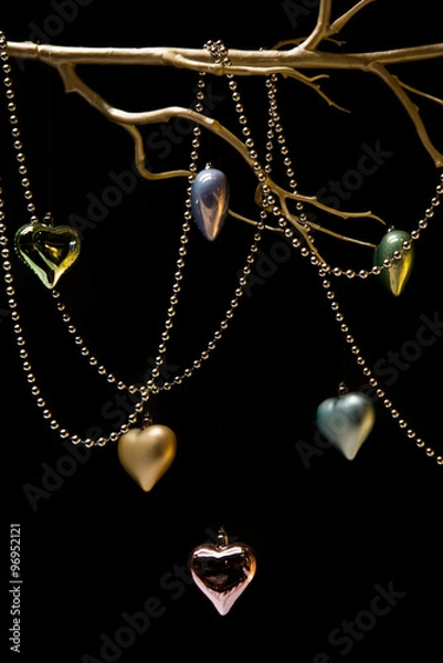 Obraz Hanging colorful Christmas balls on black background