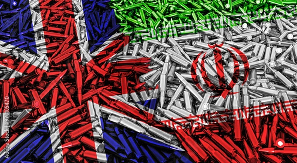 Fototapeta A large pile of bullets for automatic weapons in the form of Great Britain and Iran flags, concept of military conflict