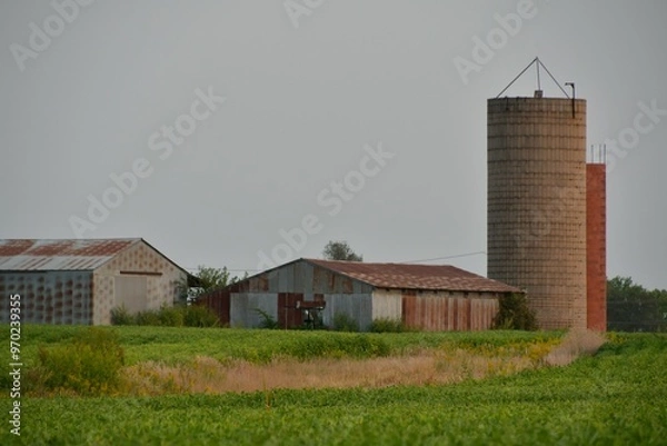 Obraz Barn and Silo in a Farm Field