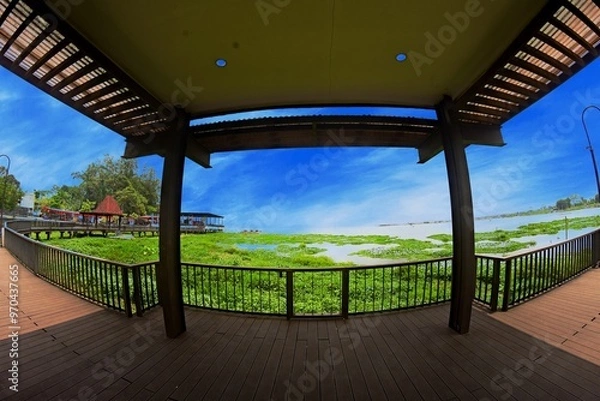 Fototapeta The bridge and wooden architecture built above Rawa Pening Lake has now become an aesthetic tourist spot for the people of Indonesia.