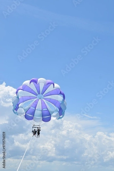 Fototapeta parasailing in the sky