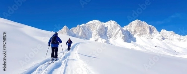 Fototapeta Skiing in the alpine with an instructor guide.