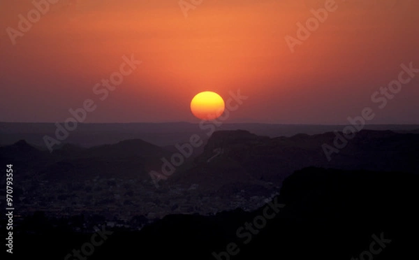 Obraz a sunset in the Thar Desert near the Town of Jaisalmer in the Province of Rajasthan in India.  India, Jaisalmer, January, 1998