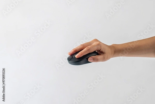 Obraz Computer mouse wireless and hand on white background.
