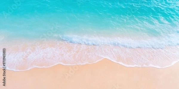 Fototapeta Panoramic picture of the waves in the ocean and the sandy beach.
