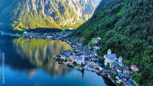 Obraz The picturesque village of Hallstatt, nestled between the lake and the mountains, showcases charming alpine architecture. A UNESCO World Heritage site, Hallstatt is a popular destination for its breat