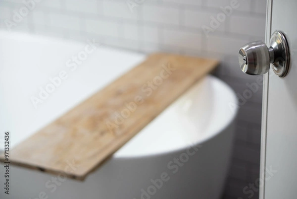 Fototapeta focus Bathroom door handles of Modern bath room with wooden shelf on bath empty and white interior design