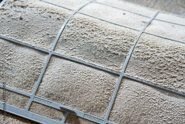 Fototapeta Close up of dust and dirty inside air conditioner filter.