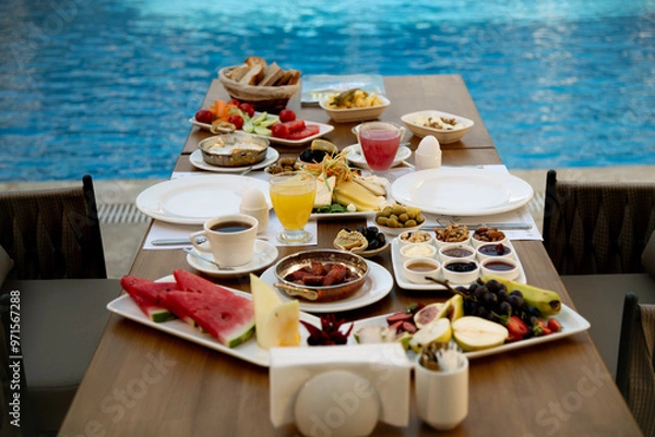 Fototapeta Breakfast Spread by the Pool