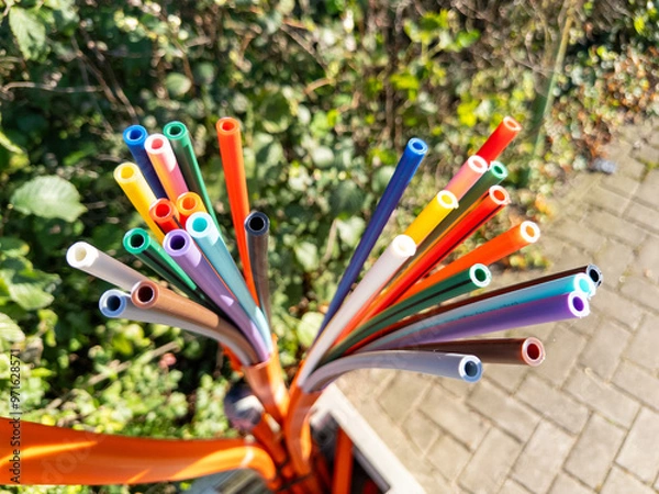 Fototapeta Empty conduits and laid fibre optic cables in public spaces are waiting to be connected to the fibre optic network as part of the fibre optic expansion for high-speed internet  