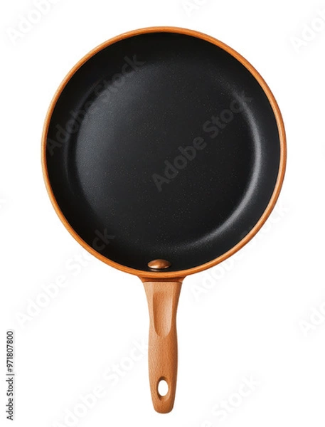 Fototapeta A sleek, non-stick frying pan with a wooden handle, perfect for cooking a variety of delicious meals.