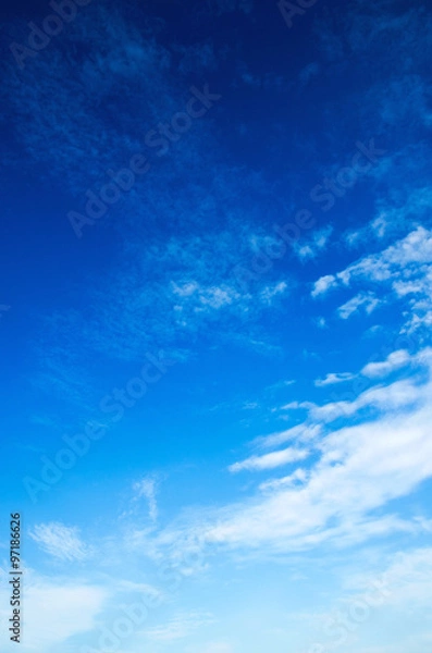 Fototapeta blue sky background with tiny clouds