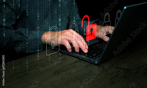 Fototapeta Cybersecurity and safety concept. A padlock is unlocked or hacked on laptop computer keyboard.  Cyber attack,  unsecured network, and internet security 