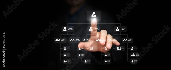 Obraz Hierarchy structure  concept. Businessman tapping at organization chart as a virtual interface screen. Company or business hierarchical organizational chart of staff and employees