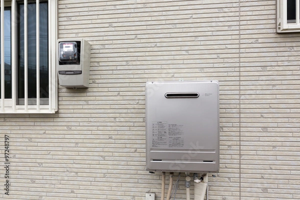 Fototapeta 給湯器と電気メーター　外壁　サイディング
